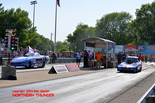 Chuck Loftin - 'Nitro Psycho' (near lane) vs 
Kris Battey - 'Batmobile' (far lane)